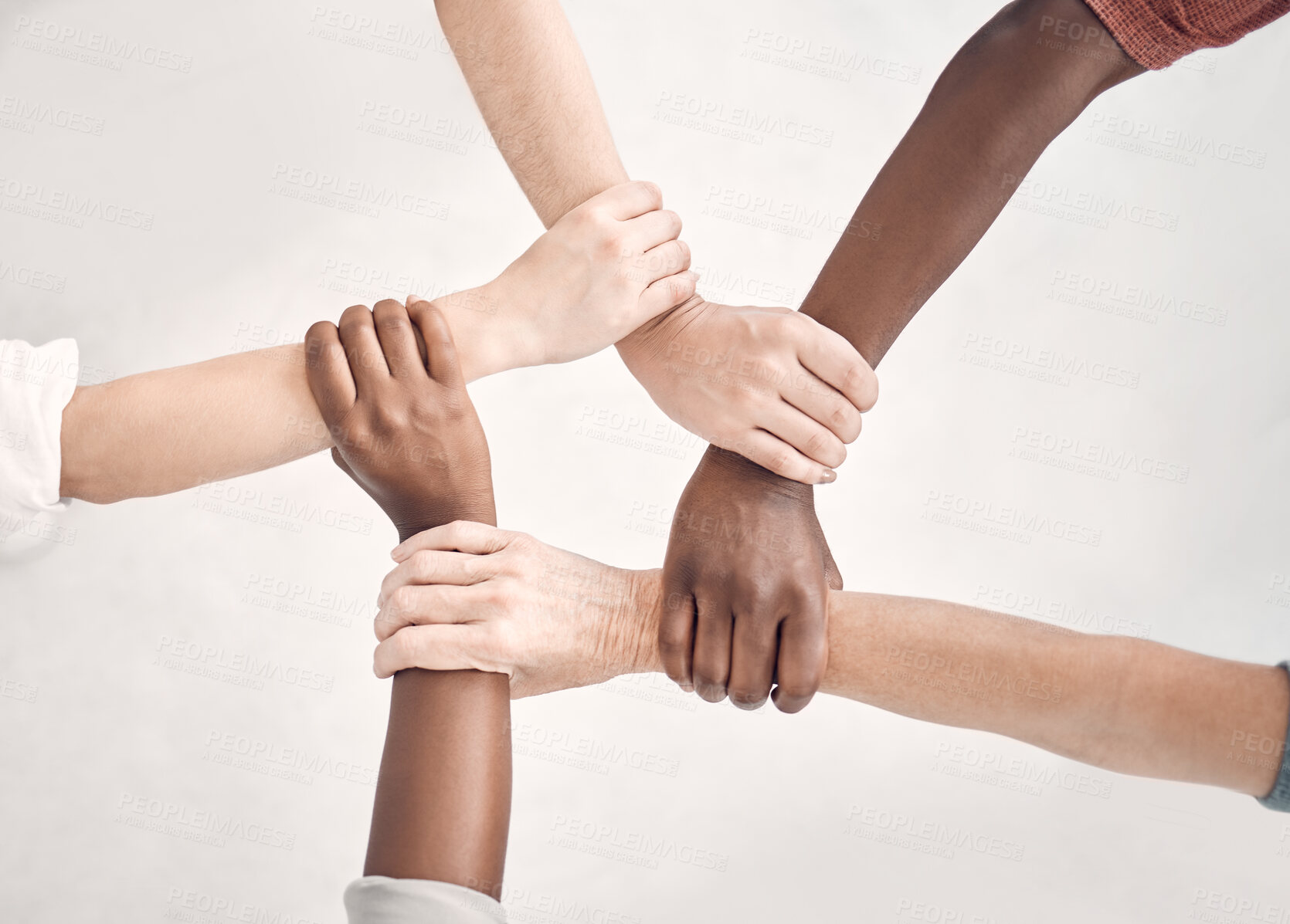 Buy stock photo Teamwork, hands of people together with support for strategy and planning with collaboration at start up. Trust in team, coworking and diversity, hand to wrist circle with employees in cooperation.