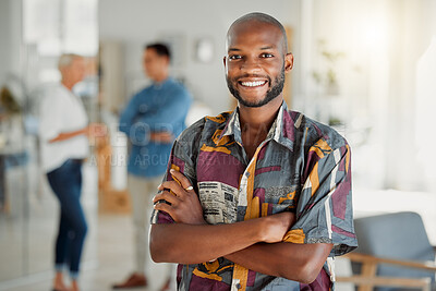 Buy stock photo Portrait of a happy African american businessman standing with his arms crossed at work. One confident male manager standing in an office at work. One content expert business professional at work