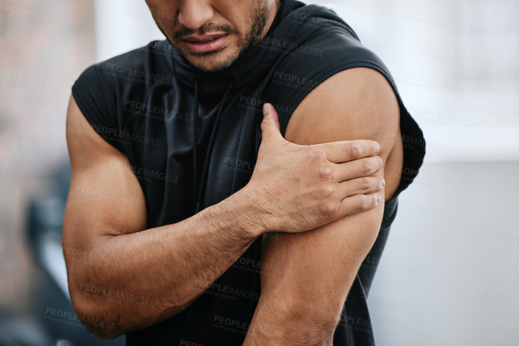 Buy stock photo Fitness, gym and injury, man with arm pain and medical emergency from workout at sports studio. Exercise, health and wellness, bodybuilder with hand on muscle ache while training and shoulder cramp.