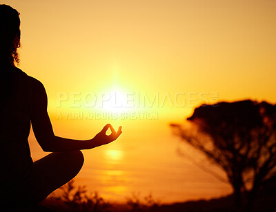 Buy stock photo Rearview silhouette yoga woman meditating with legs crossed for outdoor practice in remote nature. Mindful person sitting alone and balancing for mental health at sunset. Serene and zen in lotus pose