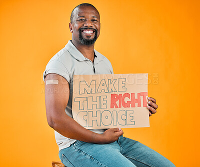 Buy stock photo African american covid vaccinated man showing plaster on arm, holding poster. Portrait of smiling black man isolated against yellow studio background with copyspace. Promoting corona vaccine on sign