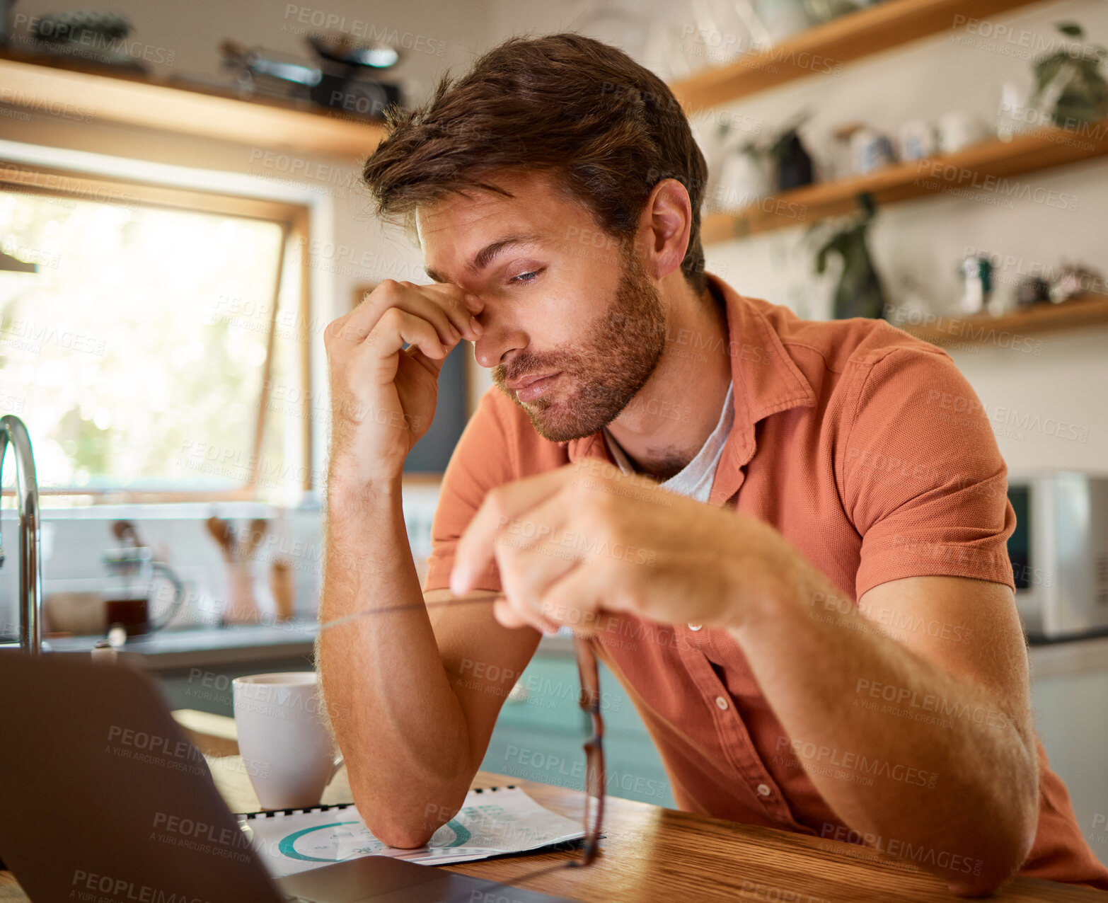 Buy stock photo Tired, laptop and business man in kitchen for remote work, freelancer and mental health. Technology glitch, eye strain and frustrated with male person at home for burnout, exhausted and anxiety