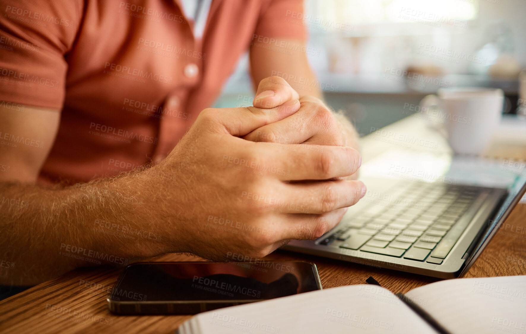 Buy stock photo Man hands, laptop and book for remote work, planning or research in the kitchen. Businessperson, working or entrepreneur with a notebook and computer at a table in the morning in a house