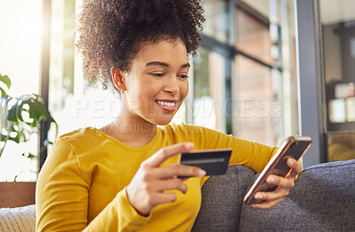 Buy stock photo Phone, credit card and woman for home online shopping, e commerce or fintech payment on sofa. Relax, loan and happy african person on internet banking, subscription and mobile app for web transaction