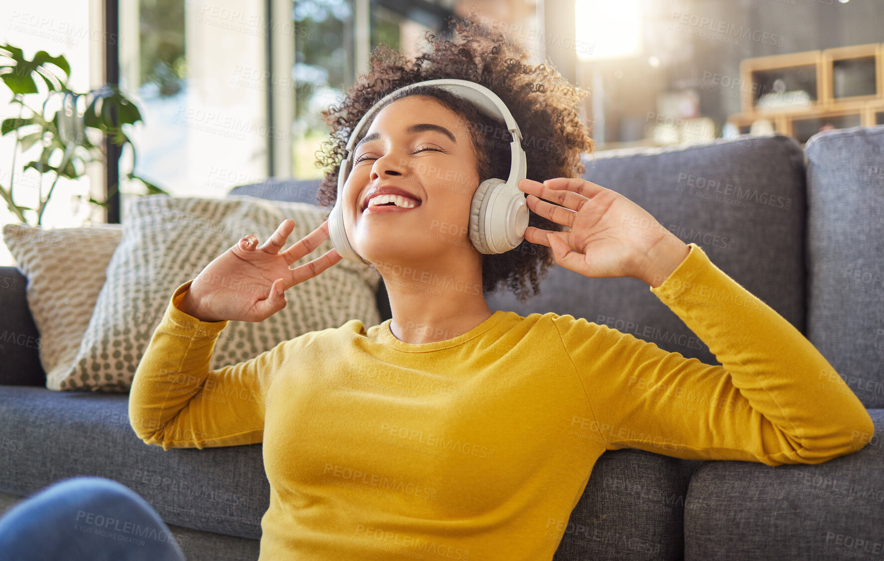 Buy stock photo Headphones, music and happy woman with mental health, wellness dance or youth audio streaming service at home. Relax, floor and dancing of young african person with audio electronics or technology 