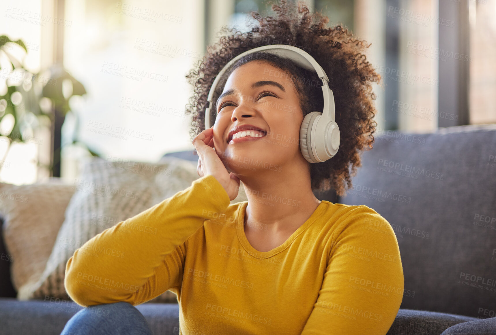 Buy stock photo Headphones, music and happy woman in home mental health, wellness ideas and youth radio or streaming service. Relax, listening and thinking or inspiration of young african person on audio technology 