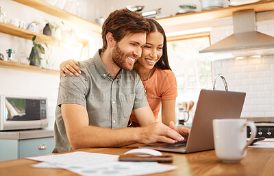 Buy stock photo Young cheerful interracial couple bonding while working on a laptop together at home. Caucasian boyfriend and girlfriend working through their bills and using a laptop. Content wife and husband browsing online on a computer