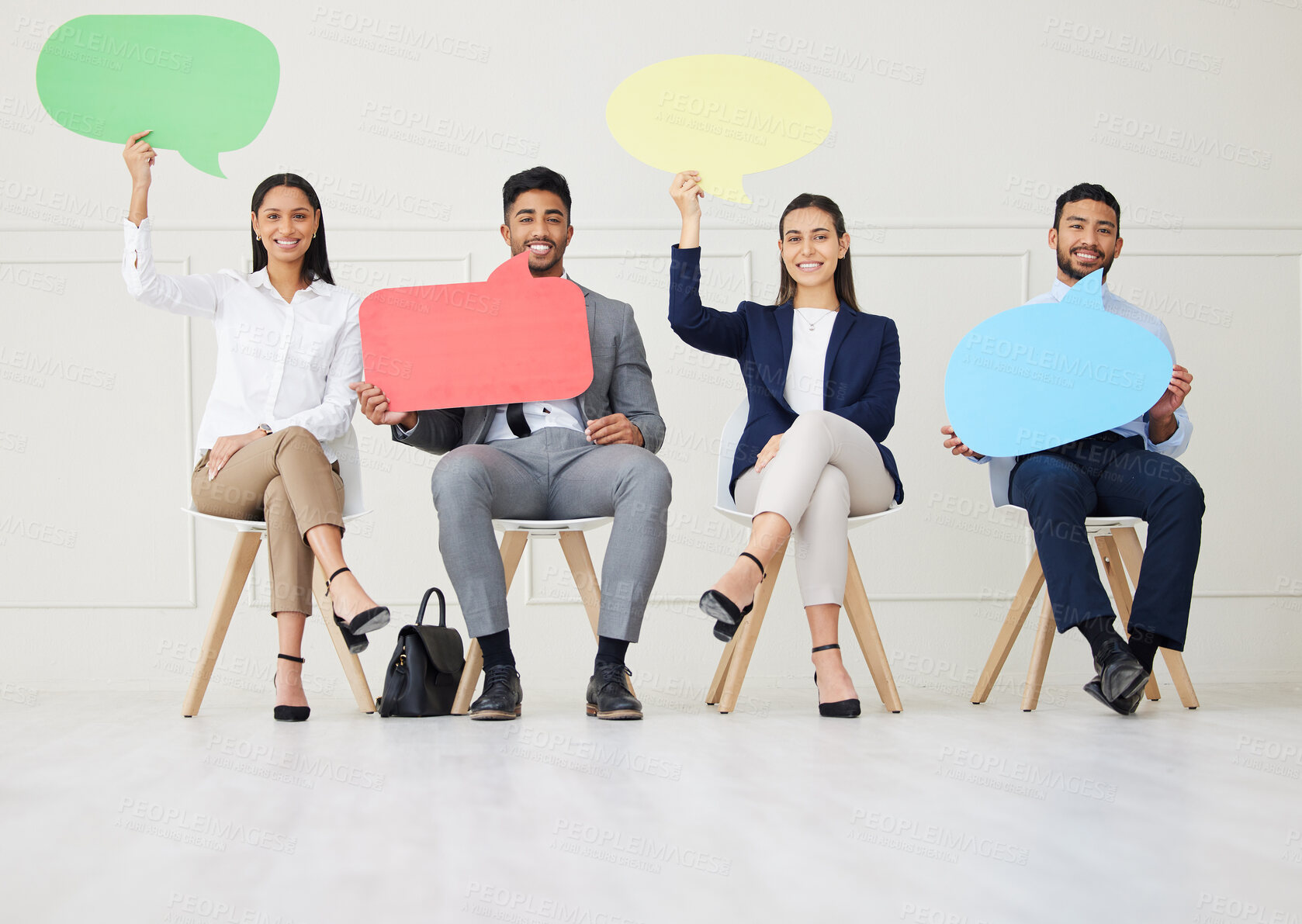 Buy stock photo Group of diverse businesspeople holding speech bubble while waiting for interview. Team of applicants together. Candidates in line for job opening, vacancy, office opportunity with unique opinions