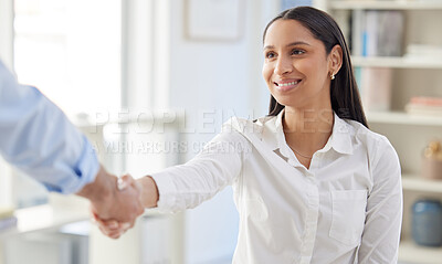 Two mixed race businesspeople in handshake after signing contract in interview. Hispanic applicant meeting CEO, hiring manger. Candidate hired for job opening, vacancy, office opportunity, promotion