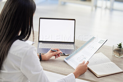 Buy stock photo Sales report, woman writing and blank screen at computer in a office with reading and data. Information, professional employee and female person with business document, notebook and desktop pc mockup