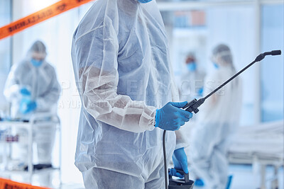 Buy stock photo Closeup on hand of biohazard cleaner holding antiseptic equipment. csi member cleaning a hospital room. Biochemist sterilise covid quarantine room. Specialist cleaning bacteria from hospital