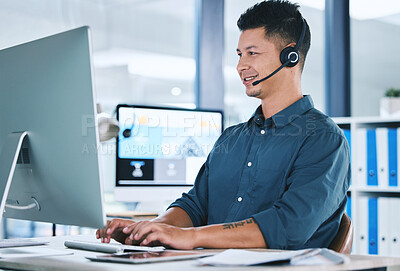 Buy stock photo Call center, customer service and a man typing on computer with a headset for contact us communication. Crm, telemarketing and sales or technical support agent or consultant person at pc for advice
