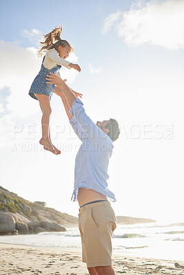 Buy stock photo Cheerful mature dad or grandfather lifting little girl against clear blue sky. Carefree man bonding and having fun with adorable baby girl outdoors and holding her up in air on a sunny day.