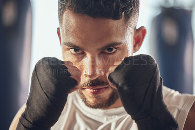 Buy stock photo Closeup on face of boxer ready to punch. Strong mma fighter ready for combat training. Bodybuilder training in the gym cropped. Portrait of boxer ready for cardio boxing workout.