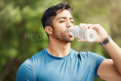 Buy stock photo Fitness, man with in park, drinking water and hiking in nature for health and wellness during exercise. Drink, bottle and fit male on hike with trees for body workout, energy and training mindset.