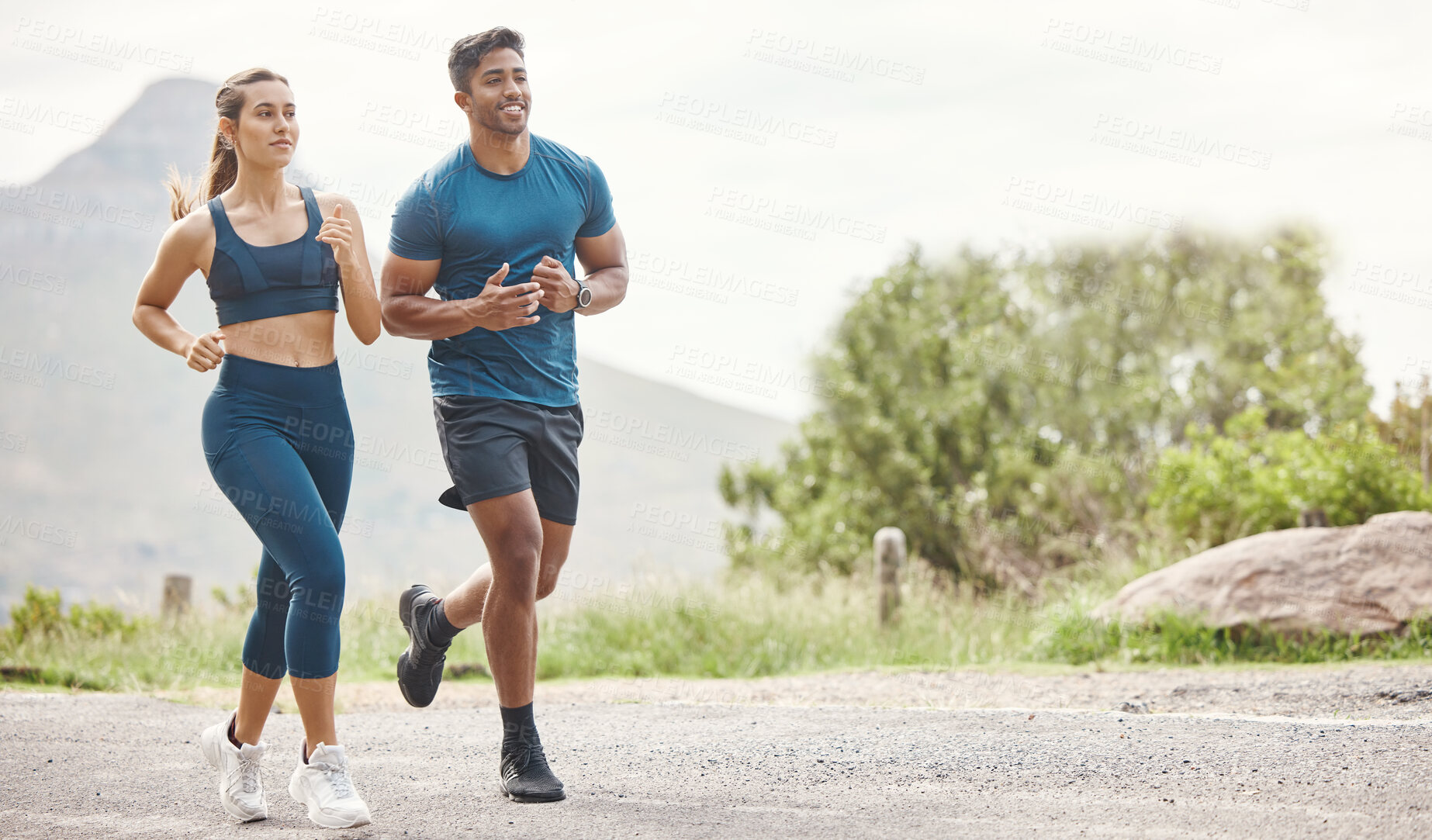 Buy stock photo Running, mountain road and couple of friends training for sports and health outdoor. Fitness, workout and sport run of young runner people together on a street with athlete exercise and race cardio