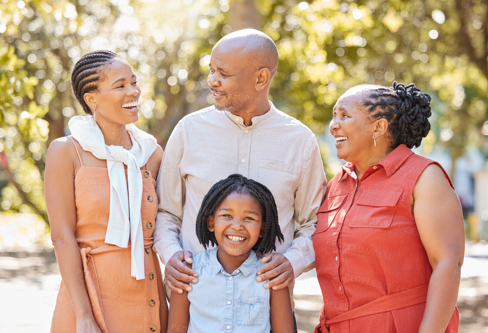 Buy stock photo Happy family, grandparents or portrait of kid in park relaxing or laughing in nature on summer holiday together. African dad, funny black woman or girl loves bonding with grandmother or grandfather 