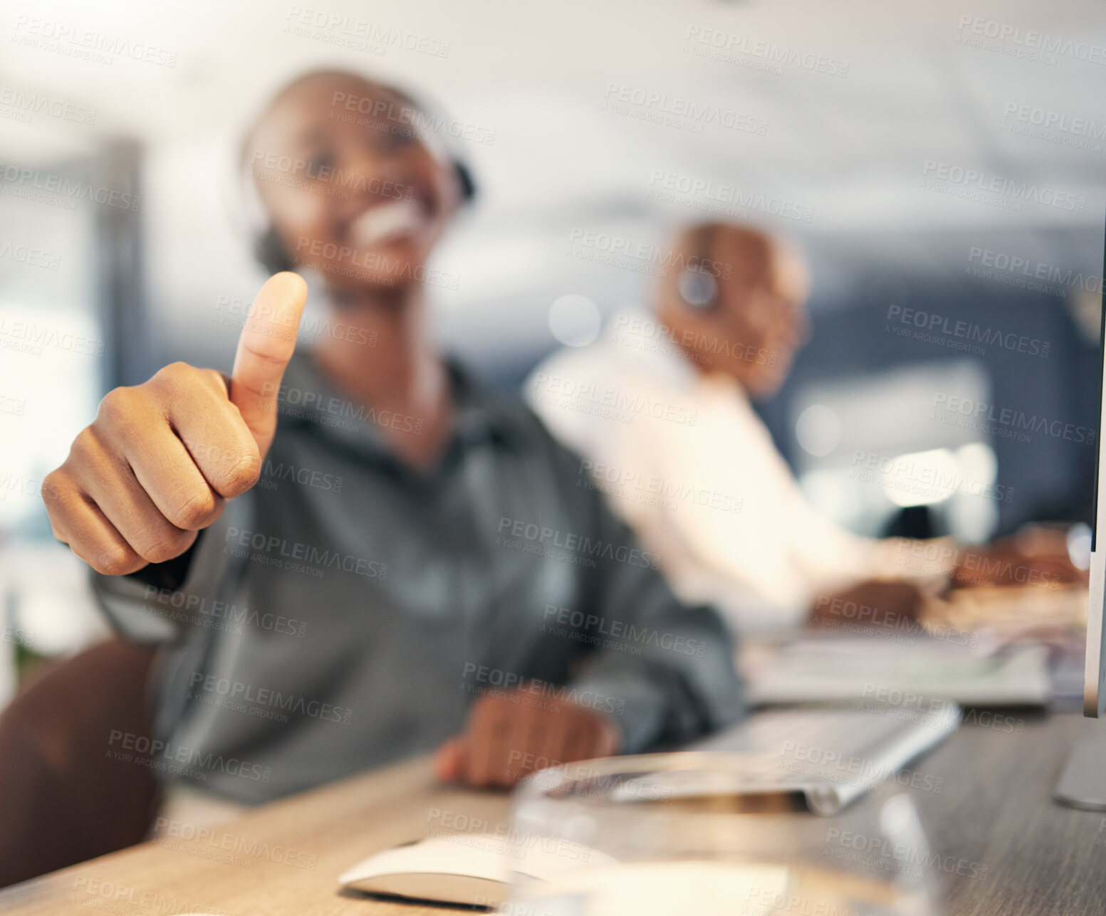 Buy stock photo Thank you, African woman with thumbs up and headset at her workplace in a office for success. Congratulations or support, telemarketing or crm and call center agent with emoji hand for motivation