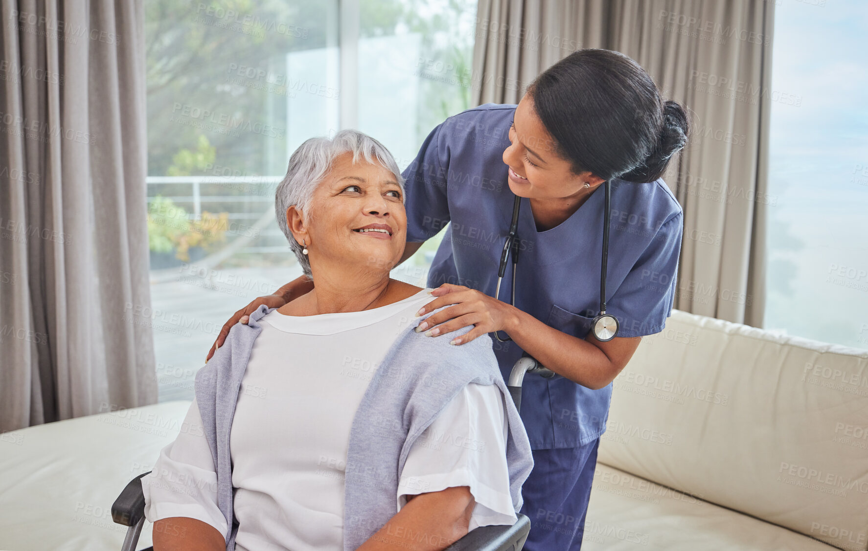 Buy stock photo Nurse, support and senior woman in a wheelchair and retirement care, home and worker in elderly healthcare. Nursing, retired person and doctor in house, lounge or medical room to check health