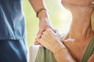 Buy stock photo Closeup of an unrecognizable doctor offering their patient support during recovery. A loving unknown doctor holding the hand of her patient and showing kindness while doing a checkup at home