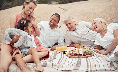 Buy stock photo Big family, beach picnic and happiness while enjoying healthy snacks and food together with a child, interracial parents and grandparents. Travel, fun and bonding with men, women and girl in summer