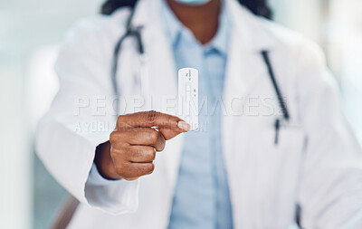 Buy stock photo Woman, doctor and hand with negative corona medical test result in the hospital. Testing during the pandemic virus to stop covid 19 and in a healthcare clinic for safety, security and wellness