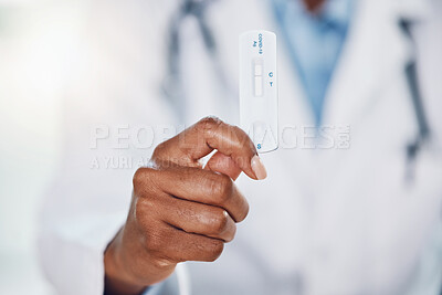 Buy stock photo Doctor hands, covid and negative rapid antigen test results in hospital for healthcare, medical risk and safety. Closeup corona virus surgeon, medicine worker and clinic expert holding pcr cassette