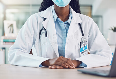 Buy stock photo Covid face mask and doctor hands  risk, safety and healthcare insurance advice with laptop for telehealth consultation. Medical black woman expert consulting in office and serious news of virus
