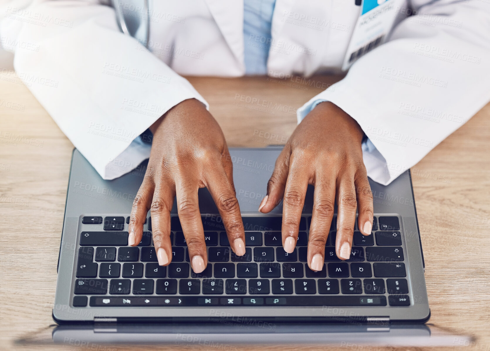Buy stock photo Hands, woman and doctor with laptop working at a desk in a hospital office. Medical expert with wireless technology to diagnose or research diseases in the field of health and medicine online or web