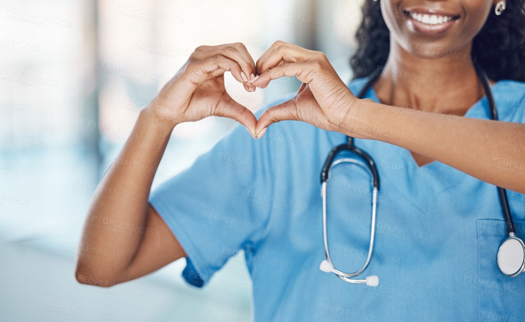 Buy stock photo Heart hand and black woman nurse in hospital with expression to show love and care for career. Professional medical facility worker in uniform with happy smile and self love sign at work.


