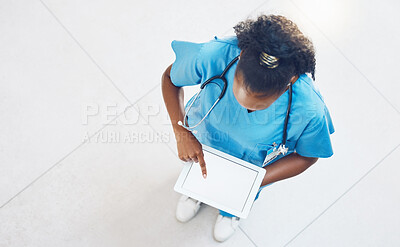 Buy stock photo Doctor, tablet and healthcare website with blank mockup screen while standing and working in a hospital from above. Medical insurance app, nurse and 5g network for innovation in health and medicine
