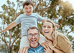 Portrait of a happy caucasian family of three being playful outside in a garden together. Smiling family bonding with their son in a backyard outside ad having fun
