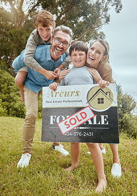 Buy stock photo Parents, kids and property with sold sign, portrait and smile for new home, start and investment for future. Father, mother and boy children with sale poster, real estate investing and family house