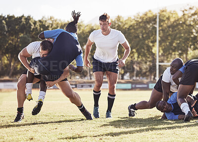 Buy stock photo Rugby, sports and men tackle for ball on field for match, practice and game in tournament or competition. Fitness, teamwork and players playing on grass for exercise, training and performance to win