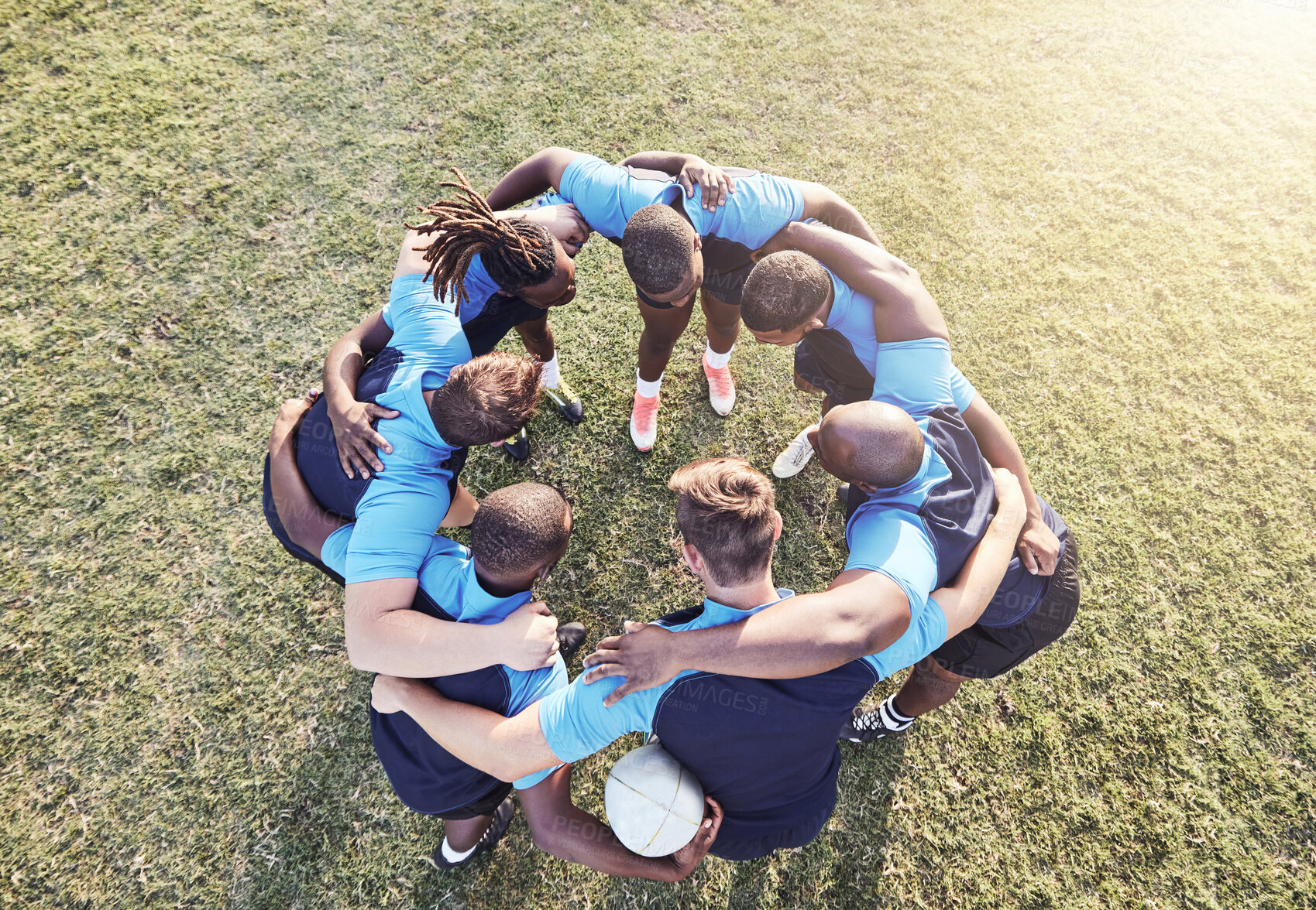 Buy stock photo Rugby, men and huddle of team with fitness, motivation and pride in competitive game. Collaboration, sports and teamwork, diverse players ready for match, workout or tournament above field at club