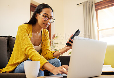 Buy stock photo Laptop, remote worker and woman with phone in home living room for typing. Freelancer, computer or person with cellphone for working, email or research for online browsing, web scrolling or multitask