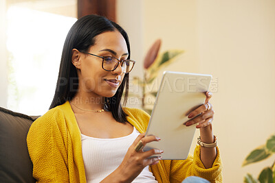 Buy stock photo Tablet, relax and woman reading in home living room on sofa, social media or ebook. Technology, touchscreen and happy person web scrolling, online browsing or streaming video, movie or film in lounge