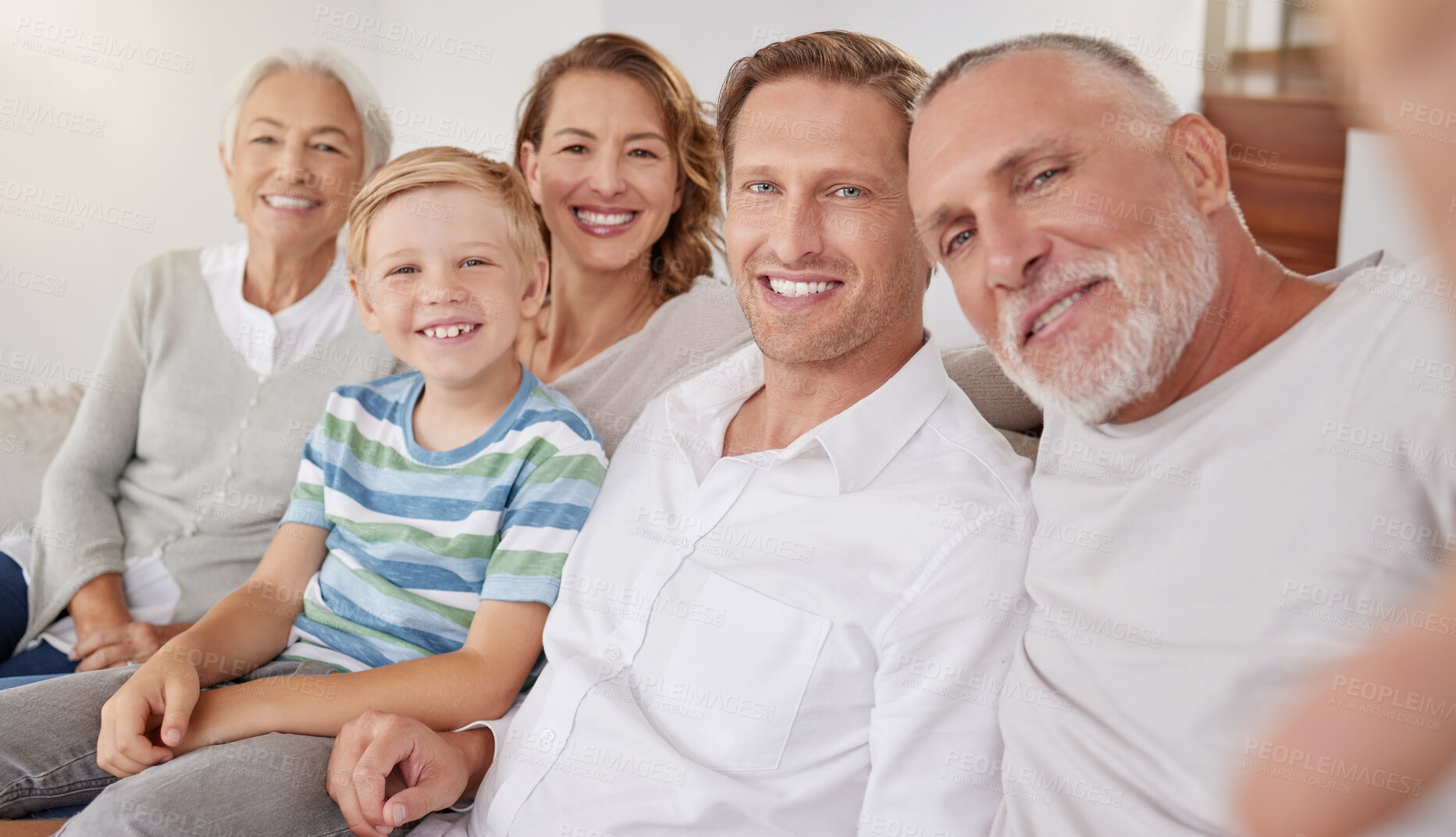 Buy stock photo Portrait of happy generational caucasian family taking selfies at home. Little boy relaxing and bonding with carefree parents and grandparents while capturing photos and pictures for special memories