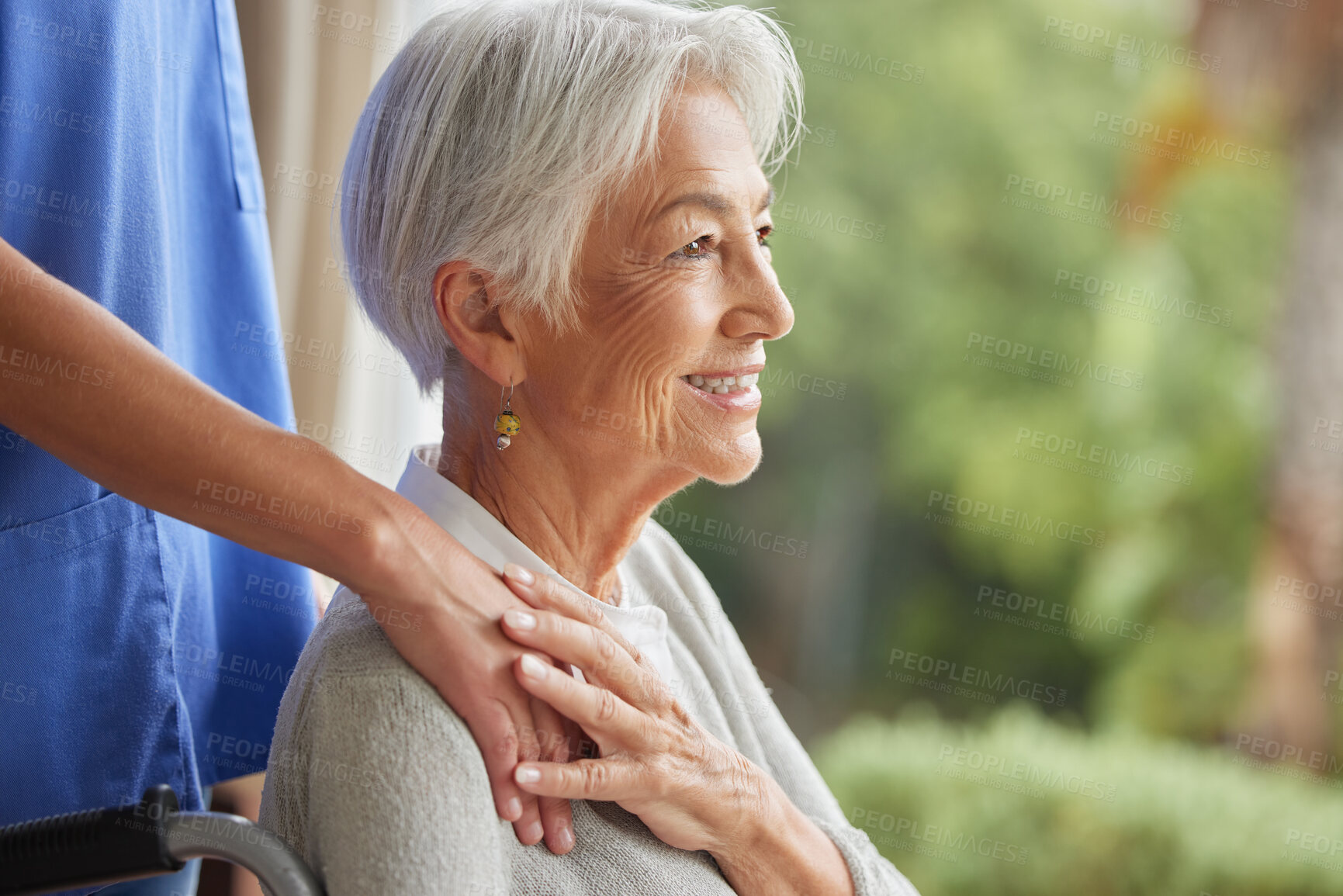 Buy stock photo Caring nurse supporting senior woman in an old age home with copyspace. Smiling elderly woman feeling happy and touching a medical aid's hand. Disabled woman in a wheelchair bonding with her caregiver