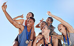 Group of diverse olympic athletes taking a selfie while showing hand gestures. Happy and cheerful runners taking a photo together. Young male sprinter taking a picture with athletes