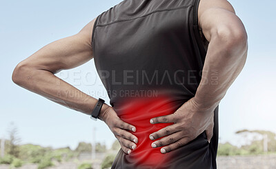 Buy stock photo Closeup shot of a young male athlete suffering with back pain while working out. Superimposed cgi highlighting an injury where a sports man is struggling with lower back ache