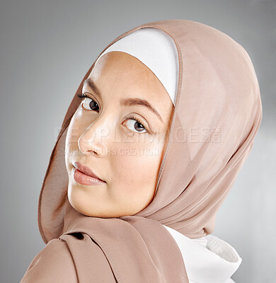 Buy stock photo Portrait of hijab wearing traditional muslim woman in arabic style in studio. Headshot of proud cultural arab with beautiful skin against grey background. Elegant fashionable oriental middle eastern
