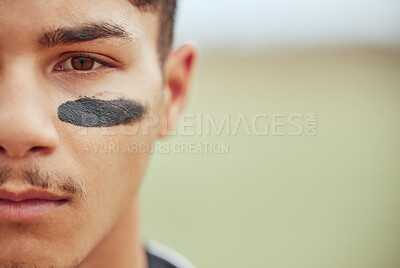 Buy stock photo Portrait of a young male baseball player standing on a field with black paint markings on his face. Focused skilled sportsman, determined and motivated to have a competitive sporting game outside