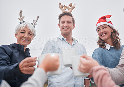 Buy stock photo Christmas, holiday and celebration with friends, family or employees outdoor for toast, happiness and quality time together. Women and man group celebration for New year party with coffee drink 