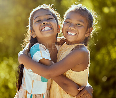 Buy stock photo Happy children, sisters and girl friends hug for love, care and bond in sun park, summer garden and backyard in outdoor Colombia. Big smile, funny and playful portrait of young kids hugging together 