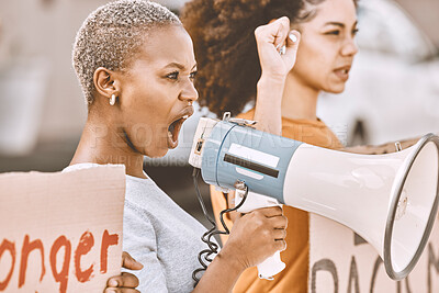 Buy stock photo Protest, angry and black woman with a megaphone as leadership for social change, justice and freedom from government. Conflict, fight and African girl shouting during a rally against racism in city