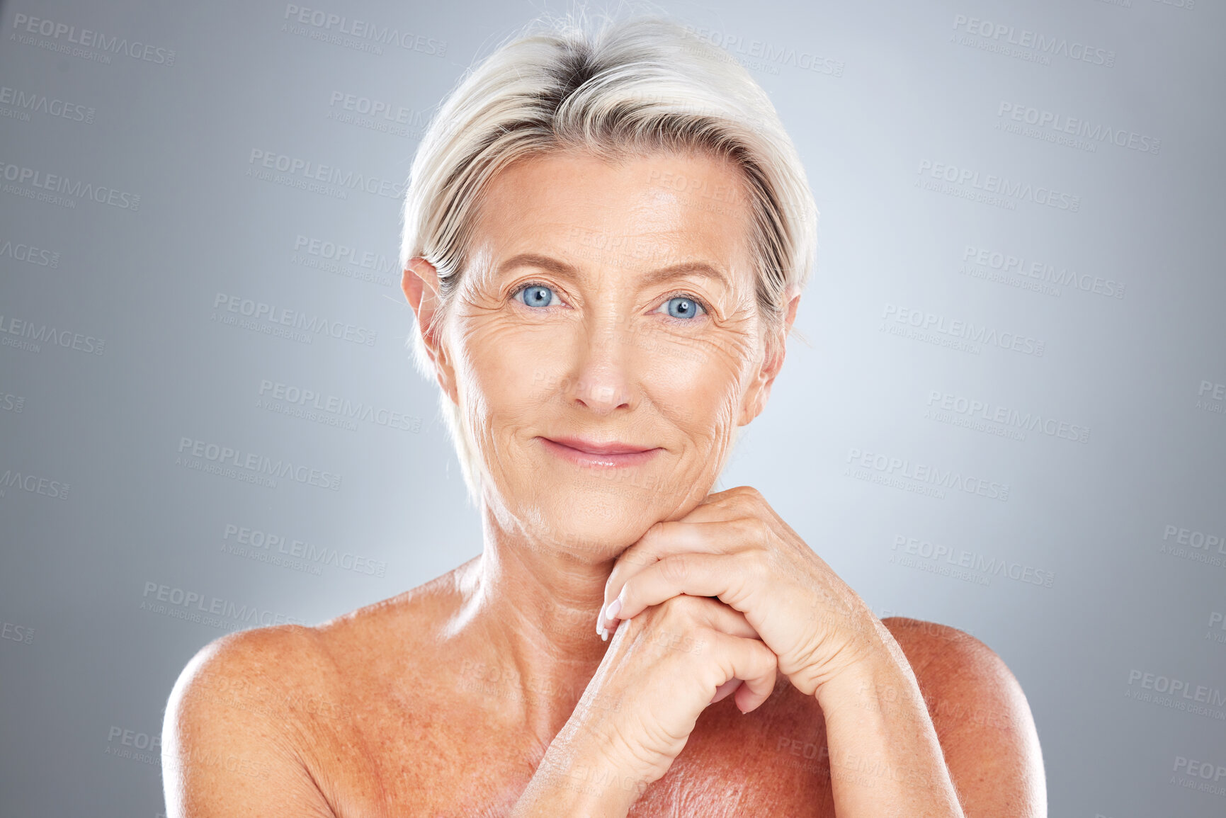 Buy stock photo Skincare, senior woman and skincare, beauty and cosmetic wellness fro anti aging in grey studio background mockup. Elderly female model happy with skin health, face and healthcare with facial makeup