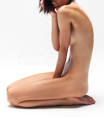 Buy stock photo Attractive nude woman kneeling while isolated on white