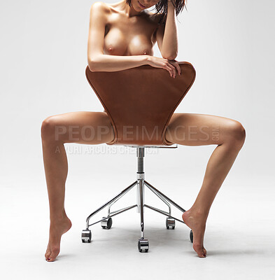 Buy stock photo Seductive nude young woman sitting on a chair - isolated