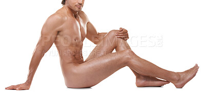 Buy stock photo Full length of a handsome naked man sitting against a white background
